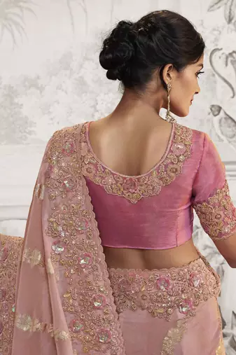 Light peach pink silk heavy thread embroidred with sequince work saree with blouse
