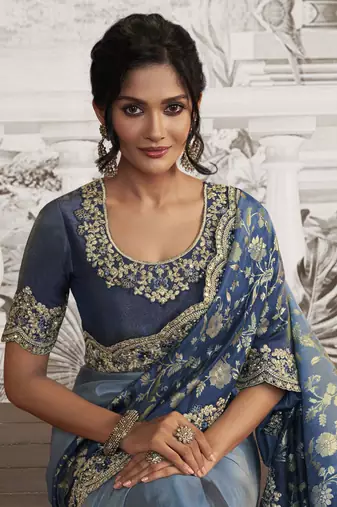 Stone blue silk heavy thread embroidred with sequince work saree with blouse