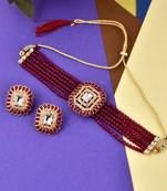 Gold plated & red stone studded choker ad jewellery set