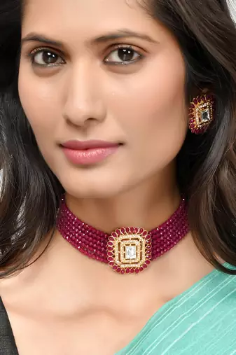 Gold plated & red stone studded choker ad jewellery set