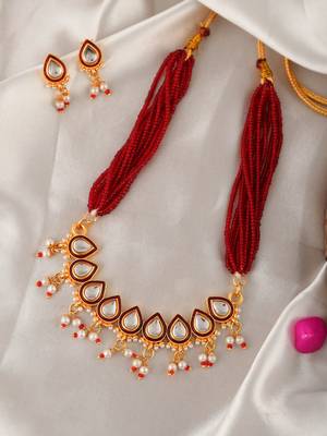 Gold plated kundan stones ethnic necklace jewellery set. 1