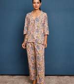 Nude pink v-neck top with culotte pants