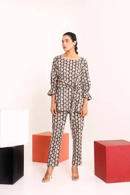 Brown tie up detailed paisley patterned top  paired with pants 1