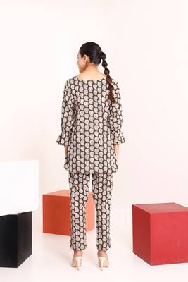 Brown tie up detailed paisley patterned top  paired with pants 2