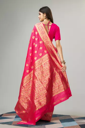 Rani pink Faux kanjivaram silk blend woven saree with zari border with blouse