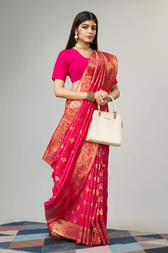 Rani pink Faux kanjivaram silk blend woven saree with zari border with blouse