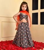 Black printed silk lehenga set with red dupatta