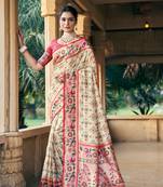 Cream woven patola silk saree with blouse