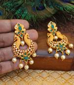 Matte finish peacock earring