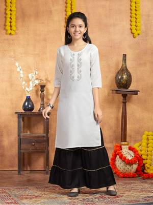 Aarika girls casual wear white colour embellished cotton kurti 1