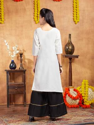 Aarika girls casual wear white colour embellished cotton kurti 4