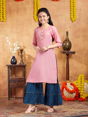Aarika girls casual wear peach colour solid lace work cotton kurti 3