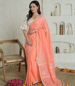 Orange hand embroidered cotton saree with printed blouse