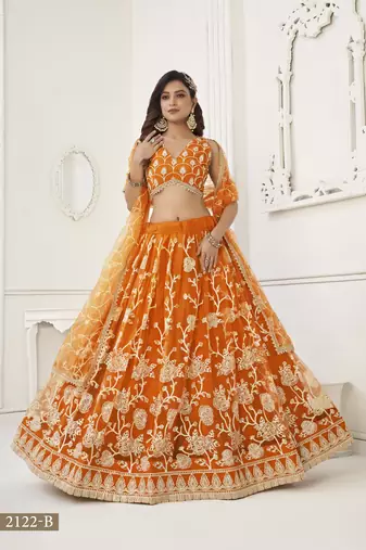 WOMEN'S ORANGE BUTTERFLY NET WITH SEQUINS AND embroidered LEHENGA CHOLI FOR WEDDING