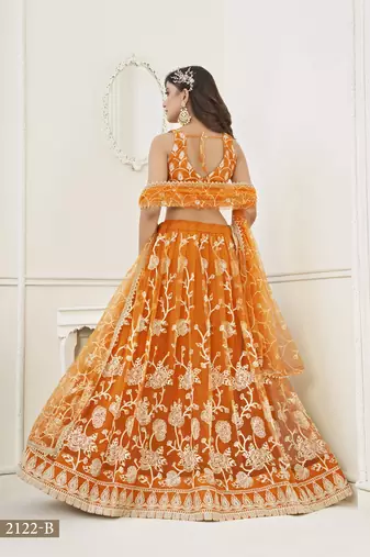 WOMEN'S ORANGE BUTTERFLY NET WITH SEQUINS AND embroidered LEHENGA CHOLI FOR WEDDING