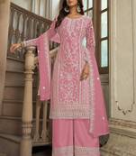 Light pink heavy butterfly net heavy thread embroidery with diamond work salwar kameez