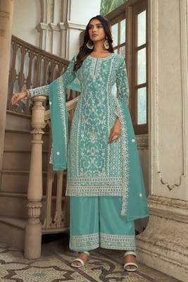Turquoise heavy butterfly net heavy thread embroidery with diamond work salwar kameez 1