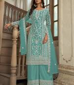 Turquoise heavy butterfly net heavy thread embroidery with diamond work salwar kameez