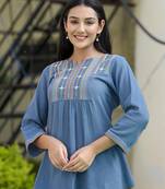 Light blue embroidered cotton top