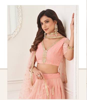 Peach Heavy Embroidery Net Semi Stitch A Line Lehenga With Blouse 3