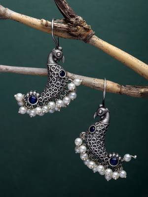 Sasha oxidized silver drop earrings with peacock figure, blue and white beads 1