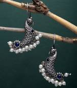 Sasha oxidized silver drop earrings with peacock figure, blue and white beads