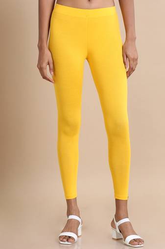 Hassu's women yellow single jersey solid slim fit ankle length legging