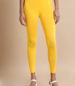 Hassu's women yellow single jersey solid slim fit ankle length legging