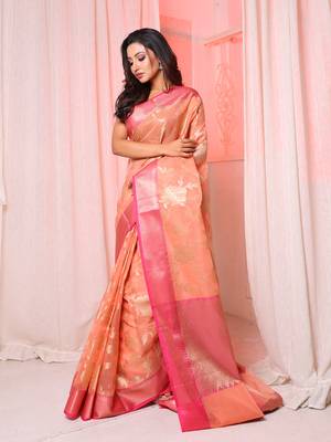 Peach Organza saree with Pink contrast border and pallu 1