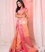 Peach Organza saree with Pink contrast border and pallu