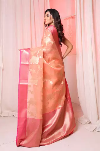 Peach Organza saree with Pink contrast border and pallu