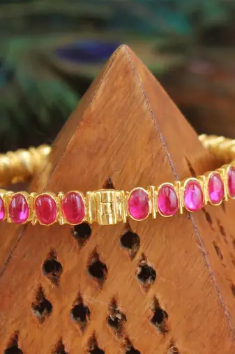 Gold platted kempu kada
