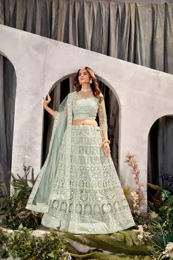 Pista Net Lehenga Choli With Embroidered Work