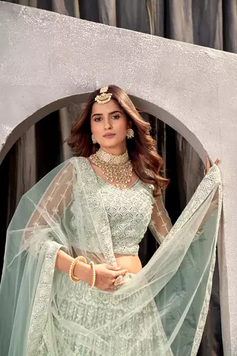 Pista Net Lehenga Choli With Embroidered Work