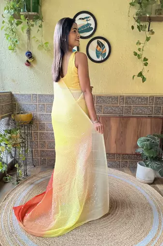 Yellow georgette with crush pattern saree with satin blouse pcs