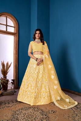 Yellow Net Lehenga Choli With Embroidered Work 1