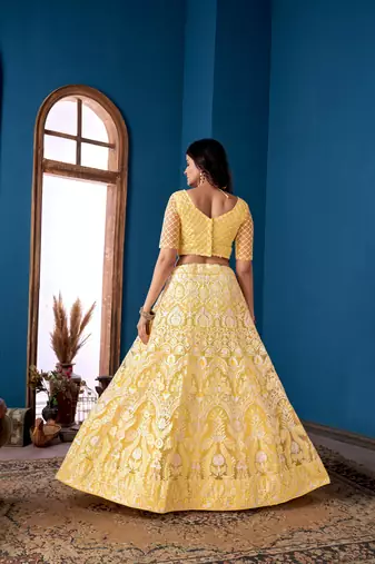 Yellow Net Lehenga Choli With Embroidered Work