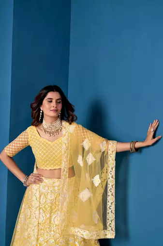 Yellow Net Lehenga Choli With Embroidered Work