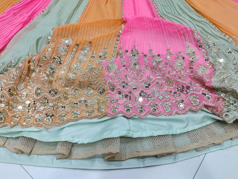 Coral Pista-Green And Orange Multicolored Zari And Sequins Embroidered Georgette Lehenga Choli