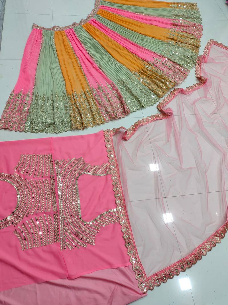 Coral Pista-Green And Orange Multicolored Zari And Sequins Embroidered Georgette Lehenga Choli