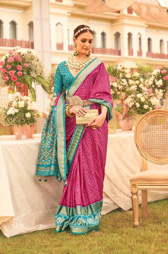 Magenta color printed weaving silk blend patola saree with blouse
