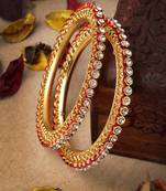 Sasha "exquisite gold-plated bangles pair with intricate jali design red tone and cz stones
