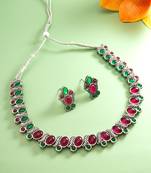 Pink and green color stone studded necklace set with par of matching earrings