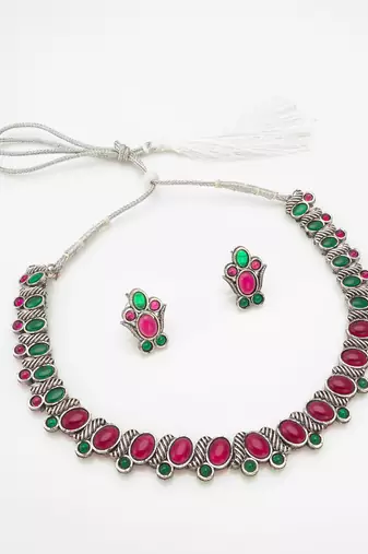 Pink and green color stone studded necklace set with par of matching earrings