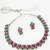 Pink and green color stone studded necklace set with par of matching earrings