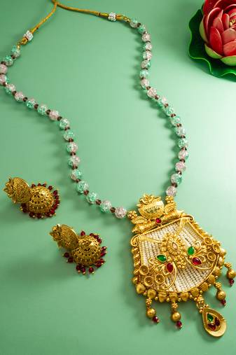 Latest gold plated handmade moti mala jewellery set with pair of matching earrings for women and girls