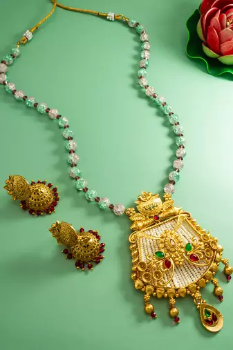 Latest gold plated handmade moti mala jewellery set with pair of matching earrings for women and girls