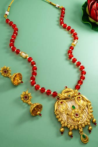 Latest gold plated handmade moti mala jewellery set with pair of matching earrings for women and girls