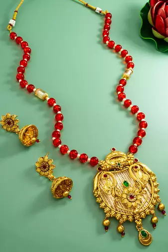 Latest gold plated handmade moti mala jewellery set with pair of matching earrings for women and girls