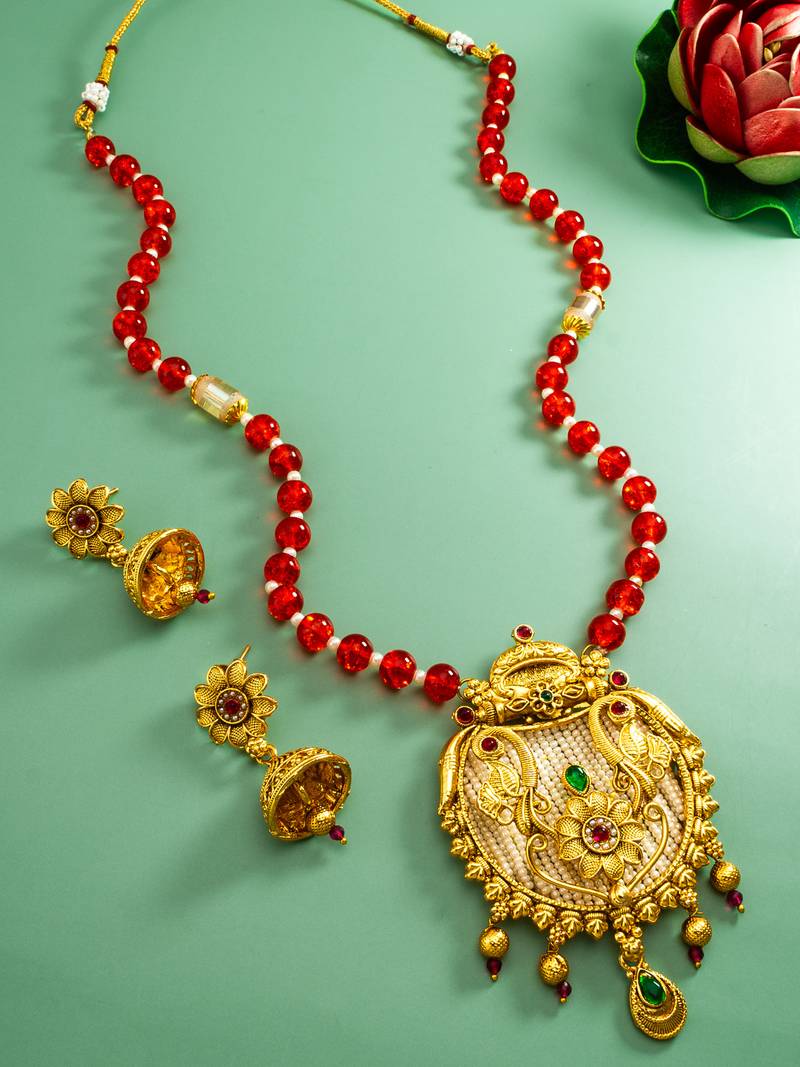 Latest gold plated handmade moti mala jewellery set with pair of matching earrings for women and girls